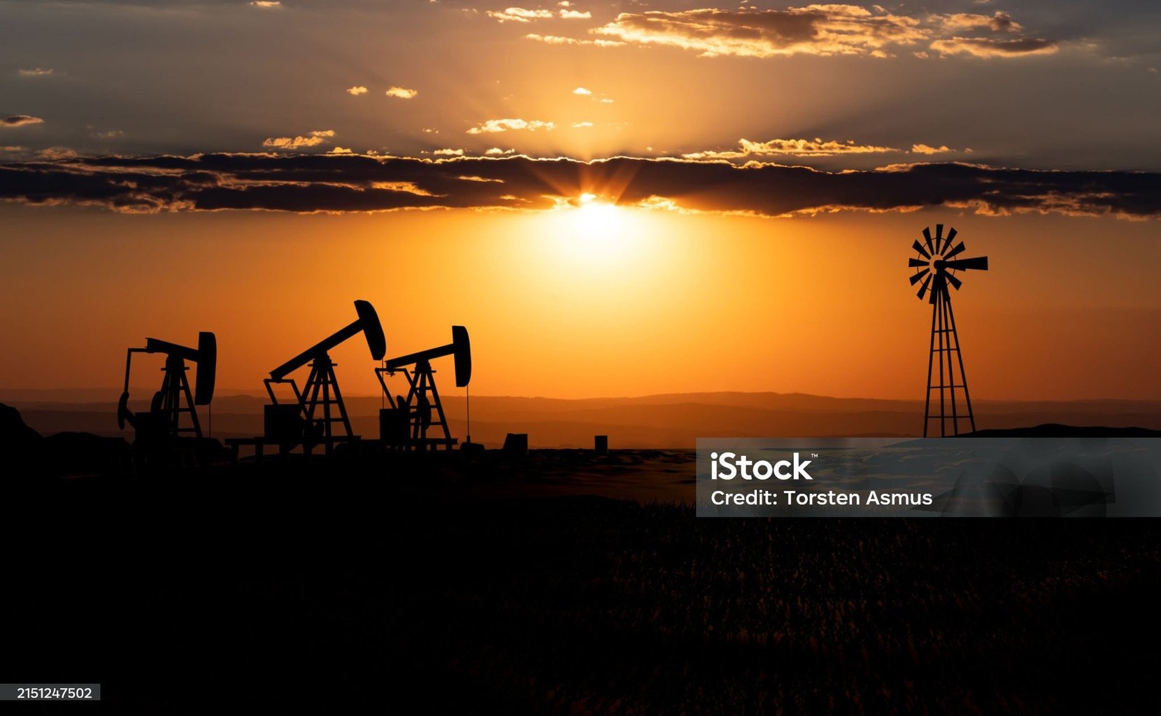 Oil field at sunset